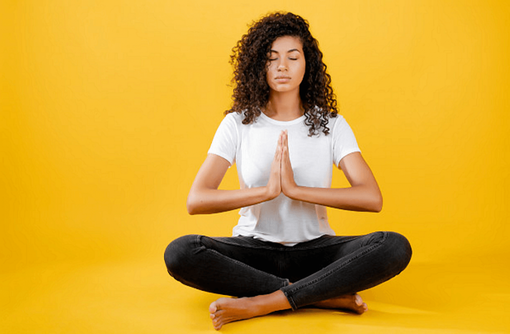 black woman meditating
